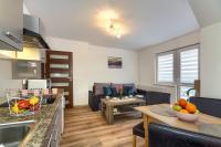 Kuchnia lub aneks kuchenny w obiekcie Apartament na Sportowej