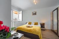 Łóżko lub łóżka w pokoju w obiekcie Apartament na Sportowej