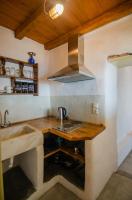 Kuchyň nebo kuchyňský kout v ubytování Dimitrakis Guesthouse