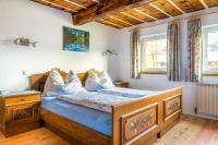 Łóżko lub łóżka w pokoju w obiekcie Ferienwohnung Schirla Stub´m