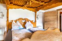 Łóżko lub łóżka w pokoju w obiekcie Ferienwohnung Schirla Stub´m