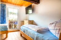 Łóżko lub łóżka w pokoju w obiekcie Ferienwohnung Schirla Stub´m