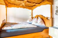 Łóżko lub łóżka w pokoju w obiekcie Ferienwohnung Schirla Stub´m