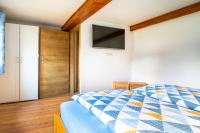 Łóżko lub łóżka w pokoju w obiekcie Ferienwohnung Schirla Stub´m