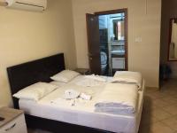 Postel nebo postele na pokoji v ubytování Hotel Kiwi