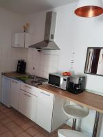 Kuchyňa alebo kuchynka v ubytovaní Apartment Ute