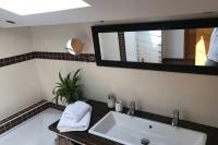 a bathroom with a sink and a mirror at COEUR de GOUDARGUES! 3 ch, 3 SDB, Extérieur, CLIM in Goudargues