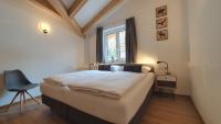 Łóżko lub łóżka w pokoju w obiekcie Alpen Appartements Viehhofen - incl Sommercard Zell am See Viehhofen