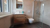 Łazienka w obiekcie Alpen Appartements Viehhofen - incl Sommercard Zell am See Viehhofen