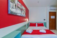 Łóżko lub łóżka w pokoju w obiekcie Hotel Airone