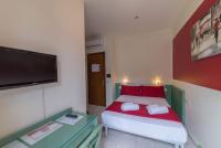 Łóżko lub łóżka w pokoju w obiekcie Hotel Airone