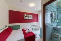 Łóżko lub łóżka w pokoju w obiekcie Hotel Airone