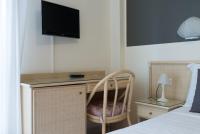 Telewizja i/lub zestaw kina domowego w obiekcie Hotel Airone