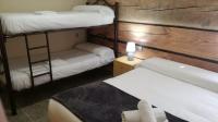 Postel nebo postele na pokoji v ubytování Apartamentos Los Robles