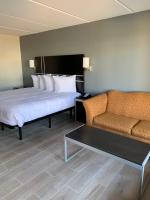 Ein Bett oder Betten in einem Zimmer der Unterkunft South Padre Island Lodge