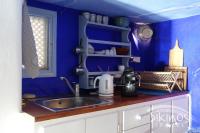 Kuchyň nebo kuchyňský kout v ubytování Seaside Traditional Cycladic House