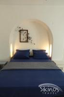 Postel nebo postele na pokoji v ubytování Seaside Traditional Cycladic House