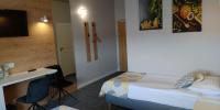 Łóżko lub łóżka w pokoju w obiekcie Hotel 107