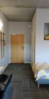 Łóżko lub łóżka w pokoju w obiekcie Hotel 107