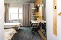 Łóżko lub łóżka w pokoju w obiekcie Hotel 107