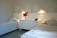 Posteľ alebo postele v izbe v ubytovaní Zefiros Traditional Hotel