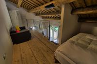 Łóżko lub łóżka w pokoju w obiekcie Grande villa storica per vacanze con giardino privato e piscina