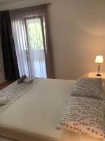 Postel nebo postele na pokoji v ubytování House Omis (3422)