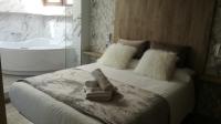 Postel nebo postele na pokoji v ubytování Apartamentos Los Robles