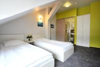 Posteľ alebo postele v izbe v ubytovaní Hostel Promenada