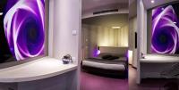 Łóżko lub łóżka w pokoju w obiekcie Pineta Hotel