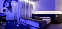 Łóżko lub łóżka w pokoju w obiekcie Pineta Hotel