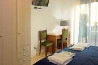 Posteľ alebo postele v izbe v ubytovaní B&B Bibliotechina