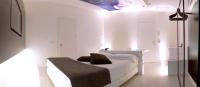 Łóżko lub łóżka w pokoju w obiekcie Pineta Hotel