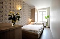 Posteľ alebo postele v izbe v ubytovaní Hostel Promenada