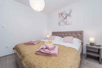Posteľ alebo postele v izbe v ubytovaní Holiday home in Sukosan - Zadar Riviera 40456