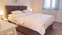 Postel nebo postele na pokoji v ubytování Ferienhaus Rovinj mit Pool