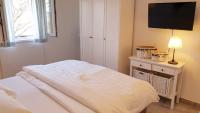 Postel nebo postele na pokoji v ubytování Ferienhaus Rovinj mit Pool
