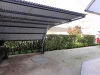 A garden outside Apartments in Bibione 24609