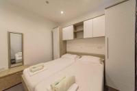 Posteľ alebo postele v izbe v ubytovaní Apartment in Starigrad-Paklenica 36685