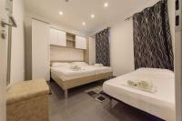 Posteľ alebo postele v izbe v ubytovaní Apartment in Starigrad-Paklenica 36685