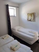 Posteľ alebo postele v izbe v ubytovaní Apartment in Starigrad-Paklenica 36685