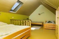 A bed or beds in a room at Apartment in Balatonkeresztur 35398