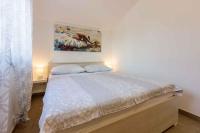 Postel nebo postele na pokoji v ubytování Apartment in Crikvenica 34970