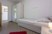 Postel nebo postele na pokoji v ubytování Apartment in Crikvenica 34970
