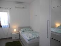 Posteľ alebo postele v izbe v ubytovaní Apartment in Crikvenica 34973