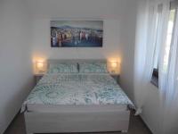Posteľ alebo postele v izbe v ubytovaní Apartment in Crikvenica 34973
