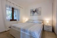 Posteľ alebo postele v izbe v ubytovaní Apartment in Crikvenica 34973