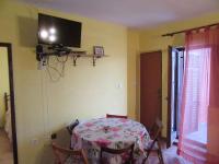 Televízia a/alebo spoločenská miestnosť v ubytovaní Apartment in Razanac/Zadar Riviera 8227