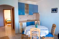 Kuchyň nebo kuchyňský kout v ubytování Apartment Banjol 10