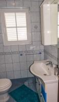 Koupelna v ubytování Apartment Banjol 10